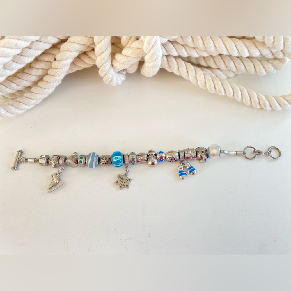 3 for $25 pick and bundle.  🏡🏡🏡 Happy New Year Charm Bracelet